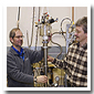 The NRC-IMS team of Drs. Pawel Hawrylak, Andy Sachrajda, Sergei Studenikin and Guy Austing (left to right), with a liquid helium cryostat. The cryostat cools equipment that measures NRC's semiconductor quantum dot structures.