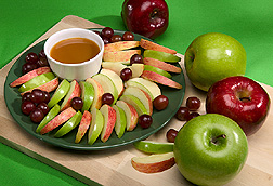 Photo: Plate of apple slices and grapes. Link to photo information