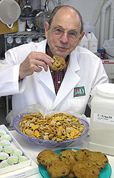 George Inglett tastes products--cookies, trail mix and green-tea chocolate--made with C-trim.