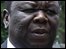 Zimbabwean opposition leader Morgan Tsvangirai arrives at his house in Harare on 17 January 2009