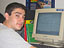 Adam Greenbaum sitting at a computer