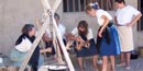 Women cleaing chickens for cooking