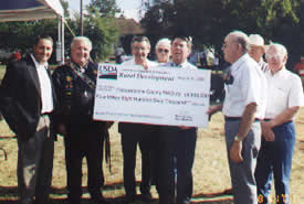 A Check is Presented to the Pottawatomie County Rural Water District No. 3 to Help Fund a Rural Water Project