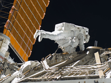 An astronaut works on the International Space Station.