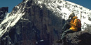 a photo of a hiker below the Diamond on Longs Peak