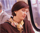 Woman sleeping on subway