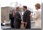 President George Bush shakes hands with Gov. Tom Ridge after signing two executive orders Friday, May 18, in Pennsylvania. Secretary of Energy Spencer Abraham and Secretary of the Interior Gale Norton are at left and right. WHITE HOUSE PHOTO BY ERIC DRAPER