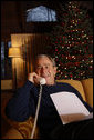 President George W. Bush makes Christmas Eve telephone calls to members of the Armed Forces, Wednesday, Dec. 24, 2008, from Camp David. White House photo by Eric Draper