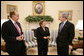 President George W. Bush meets with former U.S. Sen. Bob Dole and former U.S. Health and Human Services Secretary Donna Shalala in the Oval Office, Wednesday, March 7, 2007, who will co-chair the President’s Commission on Care for America’s Returning Wounded Warriors.  White House photo by Eric Draper