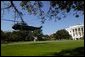 After addressing the media, President George W. Bush departs the South Lawn aboard Marine One Thursday, Oct. 7, 2004.  White House photo by Tina Hager