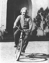 Einstein riding his bike