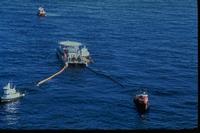 Mega Borg - US Navy skimmer removing oil from water surface