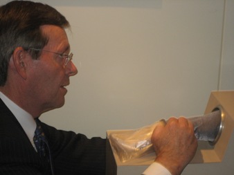 May 13, 2008 – U.S. Secretary of Health and Human Services (HHS) Michael O. Leavitt tests his skill at reading pulses during a visit to the Shanghai University of Traditional Chinese Medicine, in Shanghai, China.