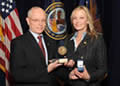 VA Secretary James B. Peake, left, presents award to Bo Derek