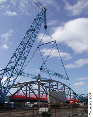 Photo: A large crane prepares to place a steel truss on the Church Street Bridge in New Haven, CT.