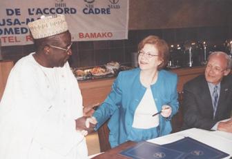 November 17, 2008 – Signing of the International Center of Excellence in Research Arrangement in Bamako, Mali. (Left to right) the Honorable Amadou Touré, Minister of Secondary and Higher Education and Scientific Research; the Honorable Gillian A. Milovanovic, U.S. Ambassador to Mali; and Dr. Hugh Auchincloss, Principal Deputy Director of the HHS/NIH/National Institute of Allergy and Infectious Diseases.