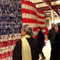 people examine the US flag