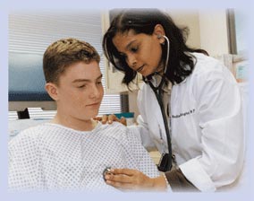 Photo of a doctor listening to a patient's heartbeat