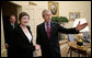 President George W. Bush welcomes Prime Minister Helen Clark of New Zealand to the Oval Office Wednesday, March 21, 2007. White House photo by Eric Draper