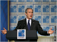 Bush at podium (AP Images)