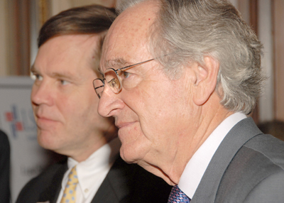 Senator Harkin (right) and LSC Chief Administrative Officer Charles Jeffress watch Senator Domenici receive his award.