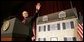 President George W. Bush waves as he arrives on stage Friday, May 13, 2005, at the Marriott Wardman Park Hotel in Washington, D.C., where he addressed the National Association of Realtors.  White House photo by Paul Morse