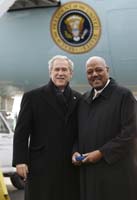 President George W. Bush presented the President's Volunteer Service Award to Craig Williams upon arrival in Philadelphia, Pennsylvania, on Saturday, December 6, 2008.  Williams, a Cheltenham resident, is a volunteer with Big Brothers Big Sisters Southeastern Pennsylvania.  To thank them for making a difference in the lives of others, President Bush honors a local volunteer when he travels throughout the United States.  He has met with more than 675 volunteers, like Williams, since March 2002.