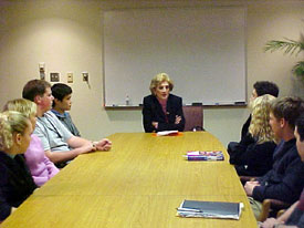 Carol D'Amico speaks with students at Lafayette Jefferson High School