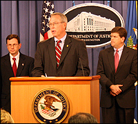 Joining the FBI's Chip Burrus, center, during a press conference on bankruptcy fraud are Deputy Attorney General Paul J. McNulty, right, and Clifford White, acting director of the Executive Office of U.S. Trustees.