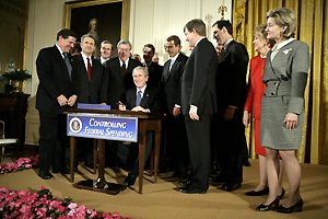 President George W. Bush signs the Deficit Reduction Act of 2005 on Feb. 8, 2006.