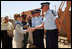 Mrs. Laura Bush greets New Zealand Police officers Sunday, June 8, 2008, during her visit to the Police Training Academy in Bamiyan, Afghanistan. Mrs. Bush traveled to Afghanistan to highlight the continued U.S. commitment to the country and its President Hamid Karzai.