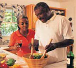 A couple prepare healthy foods