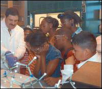 Neabsco Elementary School students watch an FBI Laboratory chemist