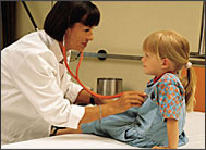 Doctor examining a child