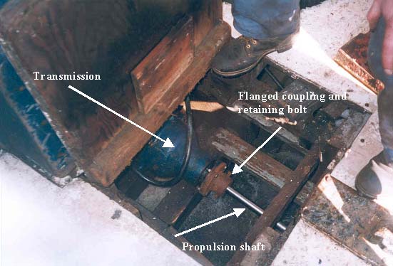 Open deck cover exposing a section of the transmission,
flanged coupling and propulsion shaft.  (Incident #2)