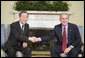 President George W. Bush and U.N. Secretary-General Ban Ki-Moon meet with the press in the Oval Office Tuesday, Jan. 16, 2007. "Thank you for your willingness to serve. Thank you for this very important discussion we just had," said President Bush. "I appreciate so very much how you opened up the discussion with a strong commitment to democracy and freedom. And the United States is willing -- wants to work with the United Nations to achieve a peace through the spread of freedom." White House photo by Eric Draper