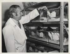 [Edward Freis with laboratory rats at the VA Hospital]. [ca. 1974].