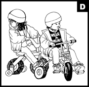 toddlers on tricycles with helmets (d)