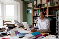 Man at desk in home office (Thinkstock Images/Jupiter Images)