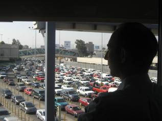 Deputy Secretary Troy overlooks vehicles entering the United States from the Customs and Border Protection’s operations center at the San Ysidro Port-of Entry.