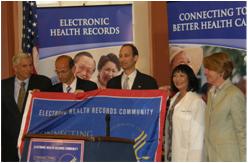 Deputy Secretary Troy declares Maine a winner of the Center for Medicare & Medicaid Services’ electronic health records demonstration project. From left to right: Dr. Josh Cutler, Executive Director, Maine Quality Forum; Governor John E. Baldacci; Deputy Secretary Troy; Dr. Charlotte Yeh, Regional Administrator, CMS; Trish Riley, Director, Governor’s Office of Health Policy and Finance.