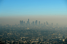 a photo of a city shrouded in air pollution.