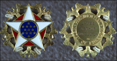Front and back images of recovered Presidential Medal of Freedom