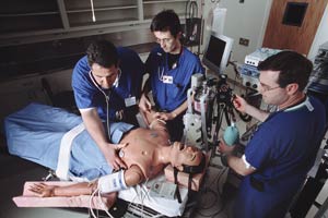 Caption: Anesthesiology students training with a patient simulator. Credit: Jeffrey Taekman.