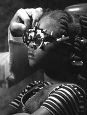 Photo of child at an eye exam.