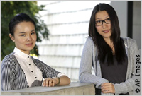 Close-up of Siyi Chen and Xiaoli Liu (AP Images)