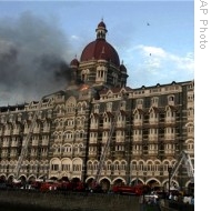 Firefighters try to douse a fire at the Taj Mahal hotel in Mumbai, India, 27 Nov 2008<br />