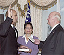 DOE Secretary Samuel Bodman swears in Thomas P. D'Agostino as Under Secretary for Nuclear Security and Administrator of NNSA as wife Beth looks on.