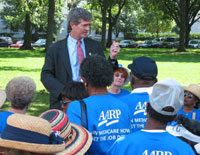photo - Miller discusses Medicare prescription drug legislation with over 100 North Carolinians at a recent AARP rally in Washington.