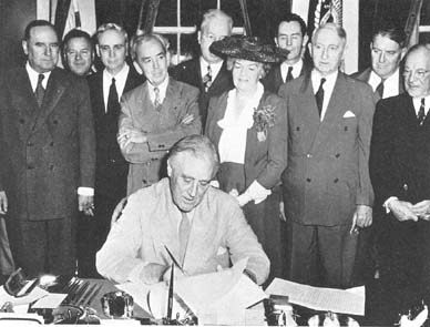 Picture of Roosevelt signing GI Bill.